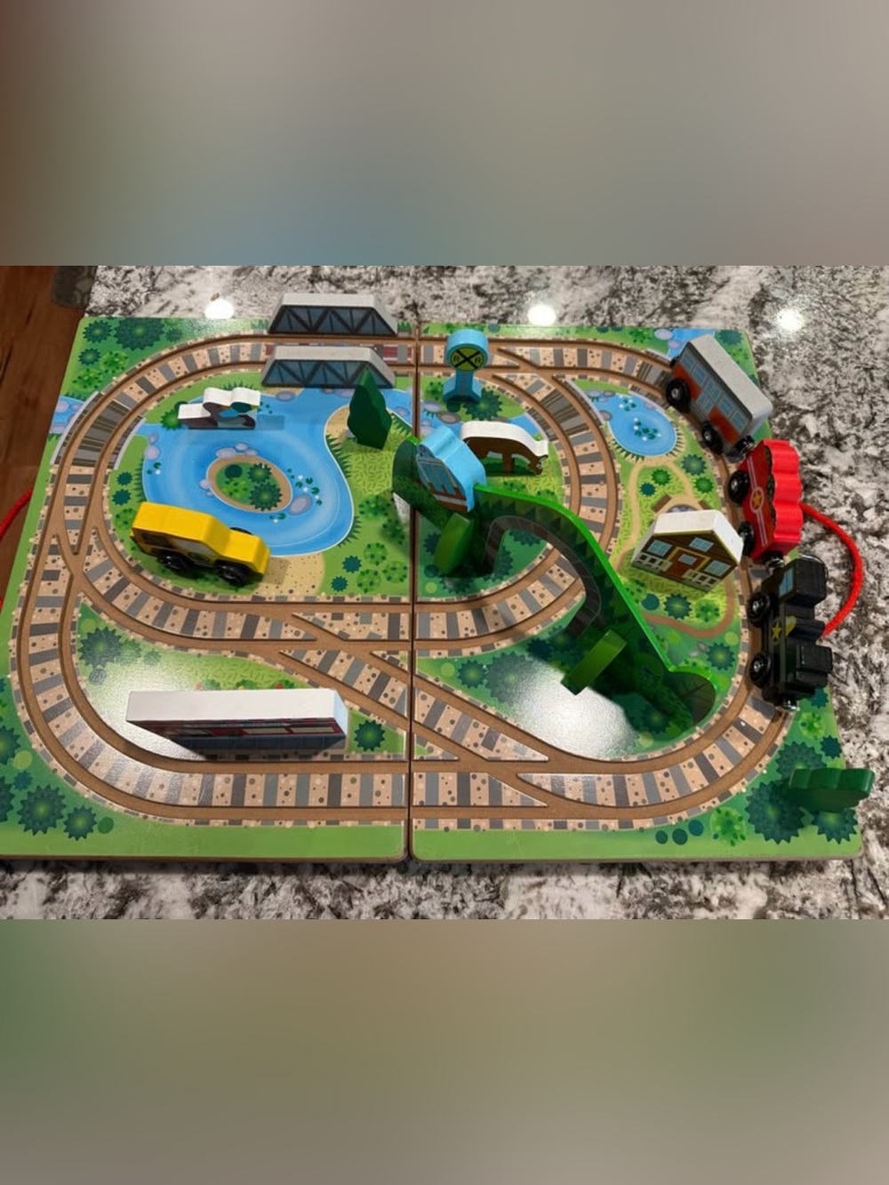 Melissa & Doug Wooden Train Set with Blue Track Mat and Green Bridge